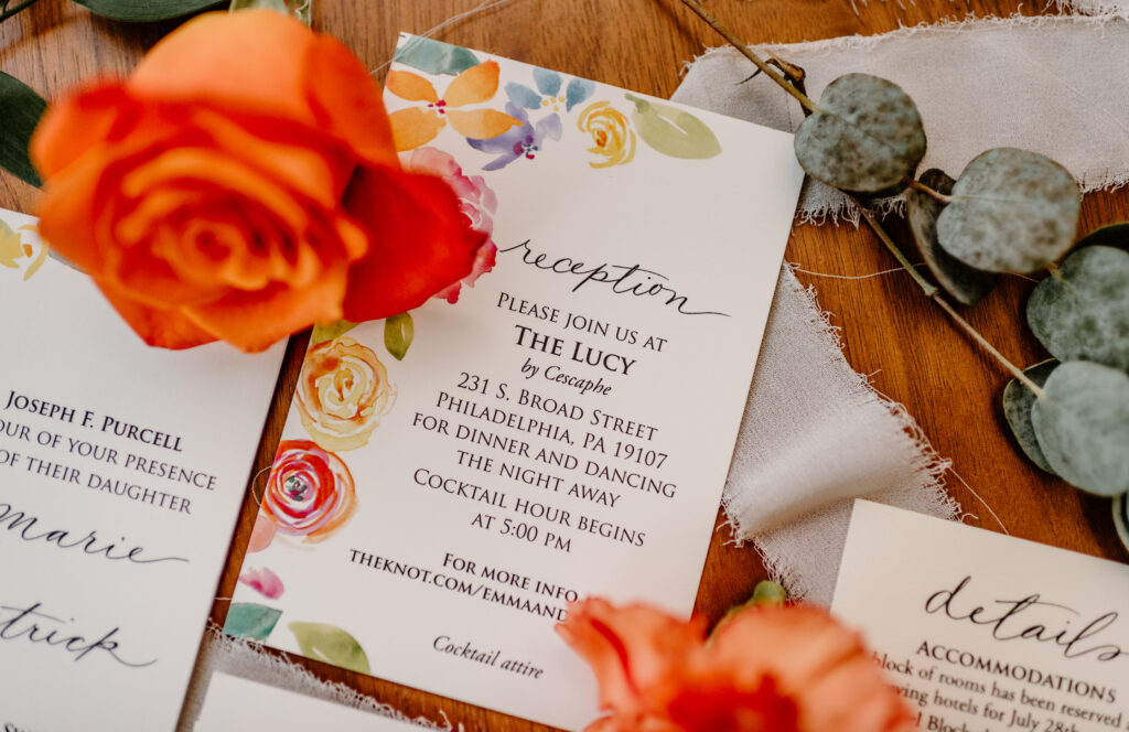 Vibrant and colorful invitations surrounding my colorful florals at a Philadelphia wedding. The Lucy in Philadelphia, PA.