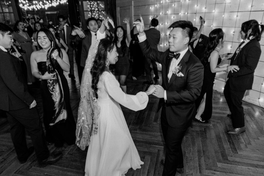 A bride and groom dancing at their wedding at Terrain at Styers. 