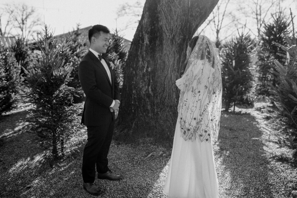 A bride and grooms reaction to their first look. Terrain at Styers.