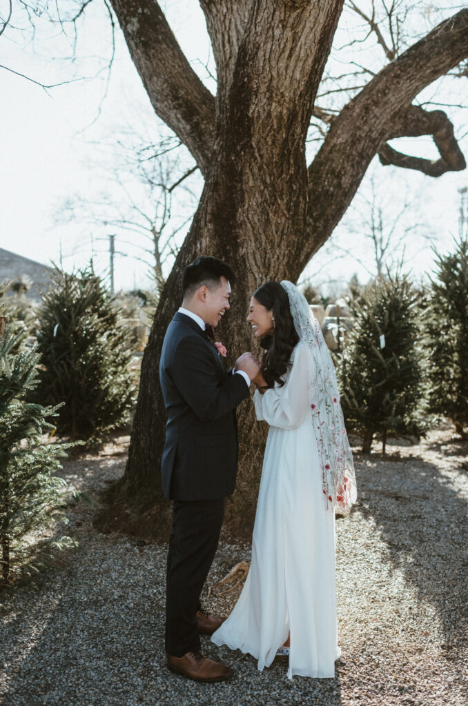 A bride and groom reaction to their first look on their wedding day. Terrain at Styers.