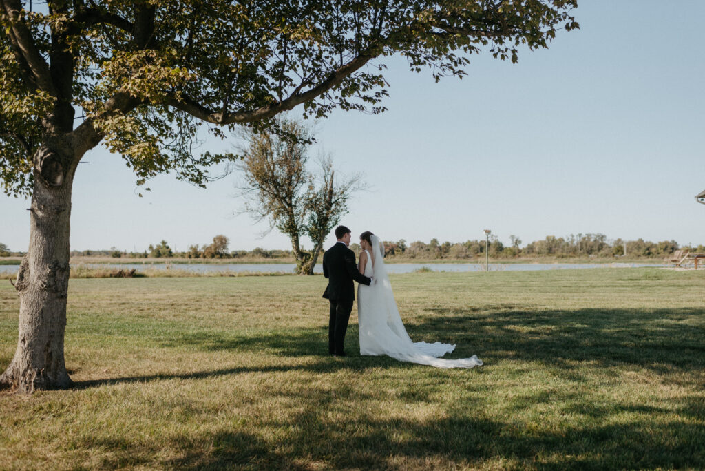 Bride and groom read private vows to each other on their wedding day. 