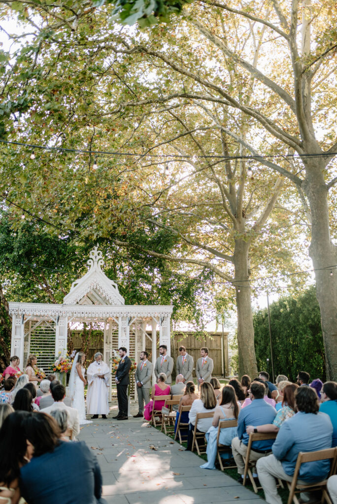 Wildflower and colorful wedding ceremony at Terrain Gardens at Styers.