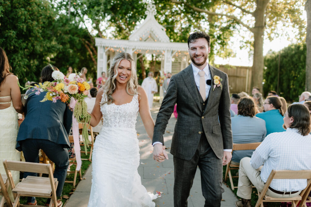 Wildflower and colorful wedding ceremony at Terrain Gardens at Styers.